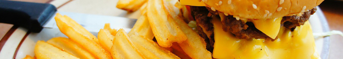 Eating Burger at Tilton Hilton restaurant in Lakeview, OH.